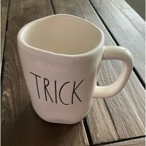 RAE DUNN White Wonky Shaped “Trick” Single-Sided Halloween Mug.